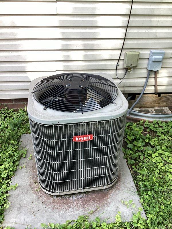 Completed sales estimate for AC recharge on residential Bryant condensing unit. Performed visual inspection of outdoor condenser unit and indoor air handler system, noting dust accumulation on equipment surfaces and condensate drain assembly. Assessed refrigerant system condition, verified electrical connections at disconnect box, and evaluated overall unit operation to provide comprehensive estimate for refrigerant recharge service.