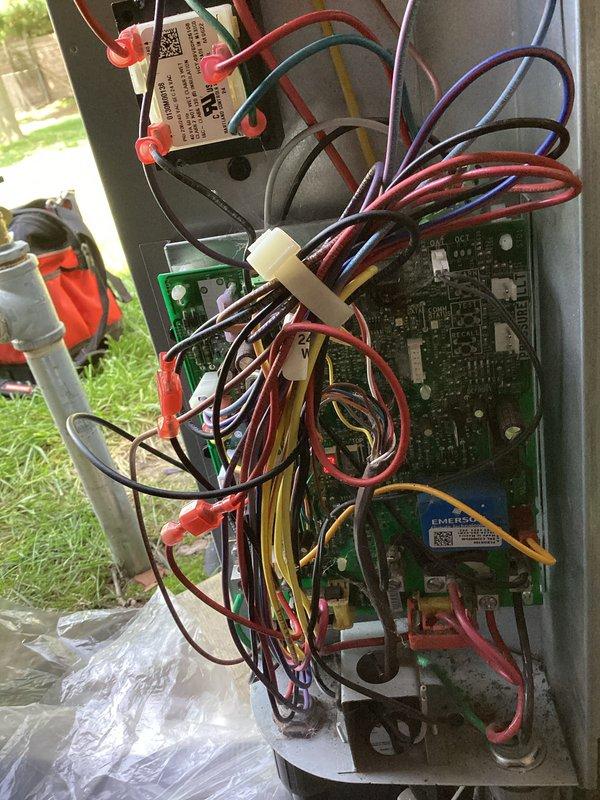 Replaced failed control board in outdoor HVAC unit. Disconnected all wire harnesses from original board, installed new circuit board, and reconnected all electrical connections including thermostat wiring, compressor leads, and fan motor circuits. System tested and operational upon completion.