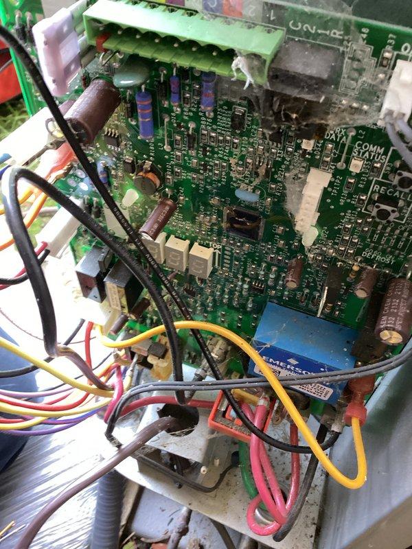 Replaced failed control board in outdoor HVAC unit. Disconnected all wire harnesses from original board, installed new circuit board, and reconnected all electrical connections including thermostat wiring, compressor leads, and fan motor circuits. System tested and operational upon completion.