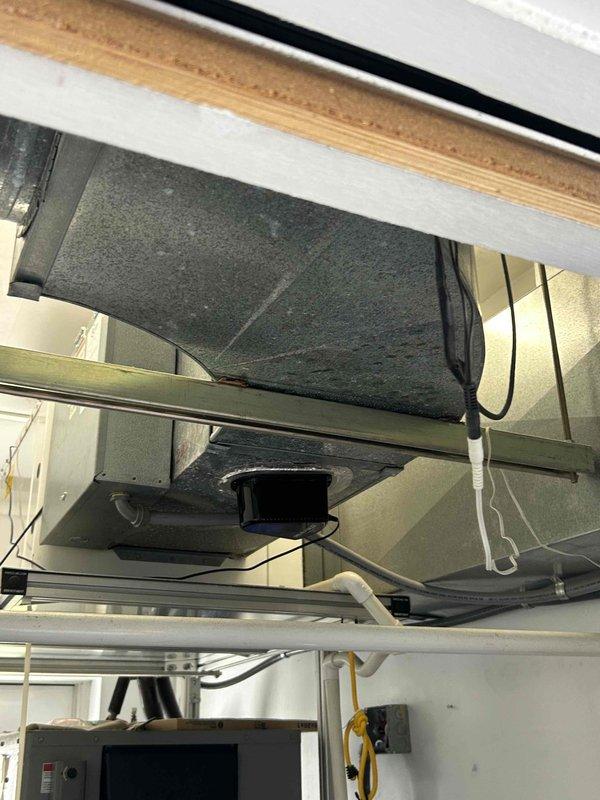Responded to service call for TF 79 unit experiencing excessive condensation and water leakage into pool room. Inspected air handler unit and condensate drainage system. Found condensate drain line issue causing water overflow. Cleared blockage in condensate drain line, verified proper drainage flow, and tested system operation to ensure condensate was being properly evacuated from the unit without further leakage.