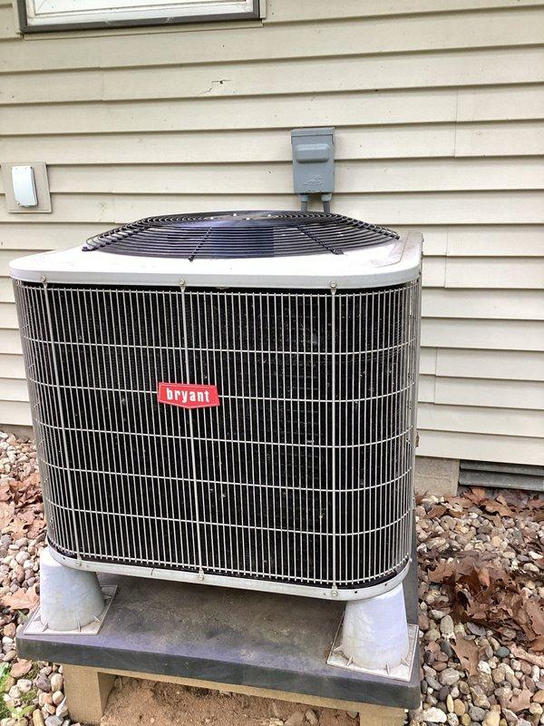 Responded to service call for water leak from HVAC unit in garage during air conditioning operation. Upon arrival, inspected Bryant condensing unit and indoor air handler system. Identified clogged condensate drain line causing water to back up and overflow onto garage floor. Cleared blockage from drain line using appropriate tools and verified proper drainage flow. Flushed condensate drain system to ensure complete removal of debris and algae buildup. Tested system operation through complete cooling cycle to confirm water was draining properly through condensate line without pooling. System restored to normal operation with no further leakage detected.