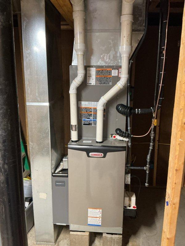 Completed routine HVAC maintenance on residential Lennox furnace system, including inspection of all mechanical components, electrical connections, and venting systems. Verified proper operation of cooling system, replaced 20x25x4 air filter, and confirmed all safety labels and specifications were clearly visible and unit was functioning within manufacturer parameters. System is operating efficiently with all components properly secured and no issues identified during inspection.