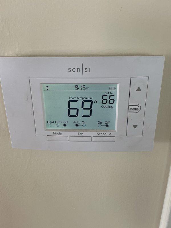 Completed comprehensive tune-up service on residential HVAC system including both heating and cooling components. Performed standard maintenance procedures on air handler unit, inspected blower motor assembly, electrical connections, and control board, replaced air filter with new Filtrete unit, and verified proper operation of Sensi programmable thermostat displaying correct temperature readings and system functionality.