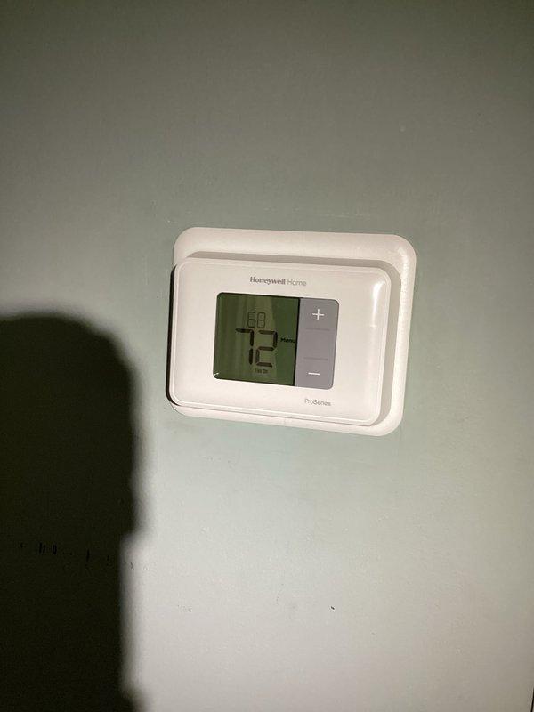Received phone call requesting follow-up discussion regarding repair options from previous Saturday appointment. Documented existing Honeywell Home ProSeries digital thermostat showing 75-degree ambient temperature with 60-degree setpoint, and photographed 16x20x4 Filtrete 1550 filter installed in HVAC system with significant dust and debris accumulation visible on surrounding metal housing. Customer callback required to review recommended repair solutions.