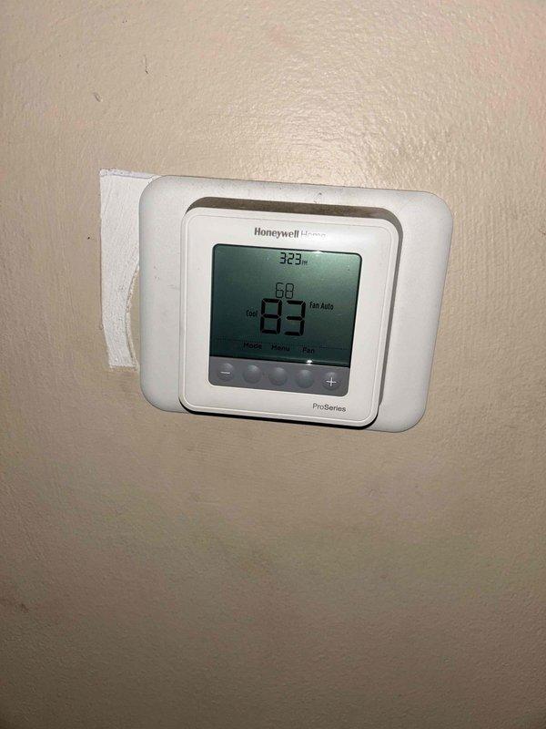 Responded to no-heat call for furnace system that stopped operating. Arrived on-site and performed diagnostic inspection of furnace unit with front access panel removed. Verified thermostat operation showing 67°F current temperature with setpoint at 60°F, display functioning properly with system in auto fan mode. Inspected internal furnace components including heat exchanger, blower assembly, and electrical connections. System restored to normal operation and tested for proper heating cycle.