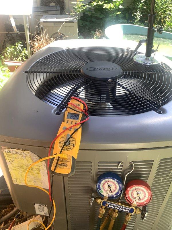 Completed preventive maintenance on Lennox mini-split cooling system. Performed standard cooling season maintenance procedures including system performance evaluation, refrigerant pressure testing using manifold gauges, and electrical diagnostics with digital multimeter. Verified thermostat operation and system controls functioning properly at 75°F cooling setpoint, confirmed outdoor condensing unit operational with proper airflow through fan assembly, and documented system status with maintenance renewal due 6/7/26.