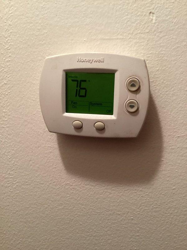 Returned to property for warranty follow-up within one week of initial service call. Verified thermostat operation and confirmed unit responding properly to temperature settings, with display showing 76°F and heat mode engaged. Inspected HSL air handler unit in mechanical room, checking refrigerant lines, electrical connections, and overall system performance. Documented equipment condition with photographs showing proper installation and no visible issues. System operating within normal parameters with no further concerns noted at time of inspection.