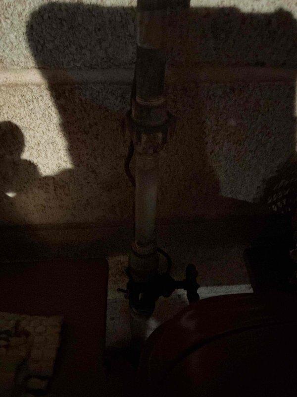 Completed monthly plumbing inspection as part of prepaid maintenance membership. Thoroughly examined basement utility area plumbing systems, including aging cast iron waste lines with flanged connections and vertical supply piping with valve assemblies. Documented condition of existing infrastructure with photographic evidence, noting surface wear and discoloration consistent with system age, with all components currently functioning within normal parameters.