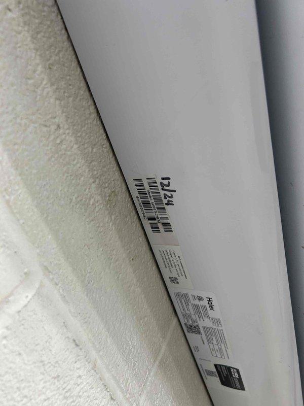 Responded to service call for Haier ductless mini-split system not producing adequate cooling, unit originally installed in December 2024. Performed diagnostic evaluation of wall-mounted air handler, verified unit power and operational status with digital display reading 58°F. Inspected airflow delivery through horizontal louvers and assessed overall system performance to identify cause of insufficient cooling output.