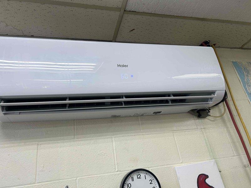 Responded to service call for Haier ductless mini-split system not producing adequate cooling, unit originally installed in December 2024. Performed diagnostic evaluation of wall-mounted air handler, verified unit power and operational status with digital display reading 58°F. Inspected airflow delivery through horizontal louvers and assessed overall system performance to identify cause of insufficient cooling output.