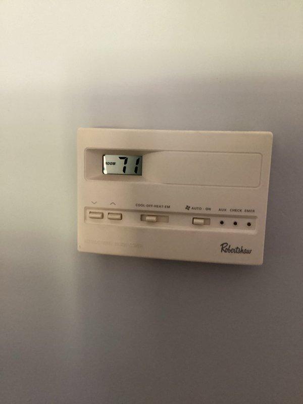 Responded to no-cooling call where A/C system would not power on. Upon arrival, inspected electrical panel and confirmed proper breaker positioning and power supply to HVAC circuit. Evaluated Robertshaw thermostat displaying 71°F and verified thermostat settings, mode selector, and wiring connections. Troubleshot system startup sequence and restored normal A/C operation.