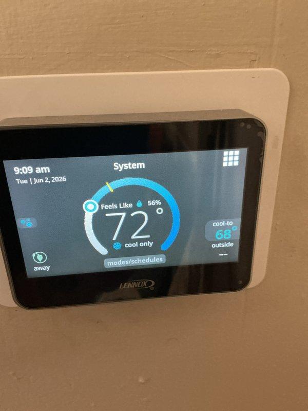 Completed comprehensive cooling tune-up on Lennox system per customer request due to frequent cycling concerns. Performed full system inspection including thermostat calibration verification, capacitor testing, electrical connection assessment, and refrigerant level evaluation. Thermostat operating properly at 72°F ambient with cooling setpoint of 68°F in cool-only mode. All electrical connections secure, capacitor within normal operating parameters, and wiring properly terminated throughout condensing unit. System cooling effectively with no immediate deficiencies noted during maintenance inspection.