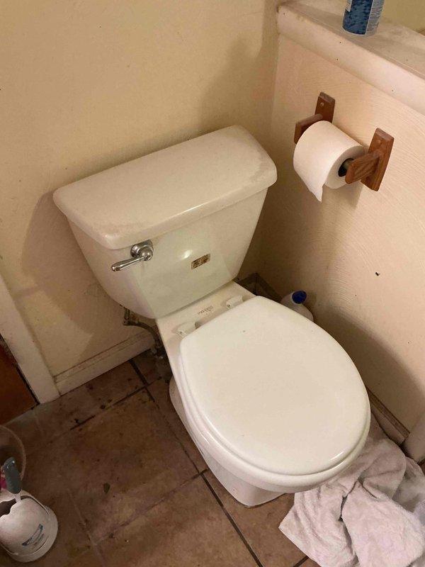Responded to service call for toilet leaking at base in century-old home. Upon inspection, determined wax ring seal had failed, causing constant water seepage onto tile floor. Removed toilet from closet flange, scraped old wax ring residue from flange and toilet base, and installed new wax ring seal. Reinstalled toilet, ensuring proper alignment with closet bolts, torqued mounting hardware to manufacturer specifications, and tested for leaks. Verified secure seal and proper function with multiple flush cycles.