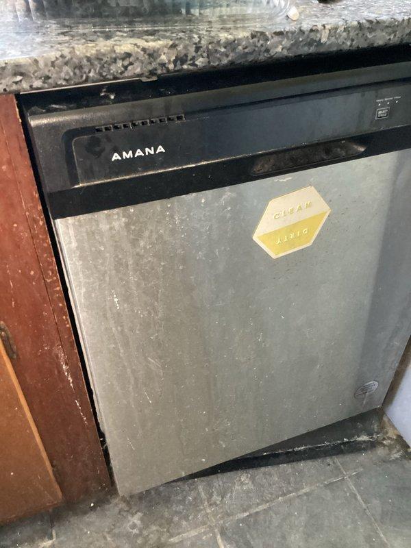 Completed plumbing inspection and investigated reported cranking noise from garbage disposal when empty. Inspected disposal unit, electrical connections, and drain lines. Documented existing conditions of kitchen plumbing fixtures with photographic evidence for maintenance records.