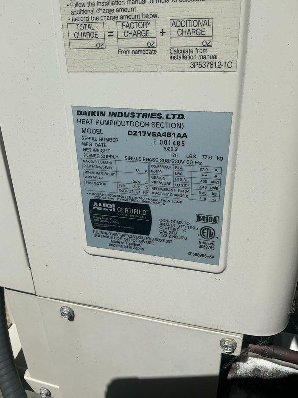Completed cooling maintenance on Daikin DZ17VSA48I1AA heat pump system, model year 2020. Performed standard preventive maintenance procedures including system inspection, verification of refrigerant charge levels per factory specifications, and documentation of unit nameplate data showing R410A refrigerant and 208/230V single-phase power supply. Unit operating within normal parameters with no deficiencies noted.