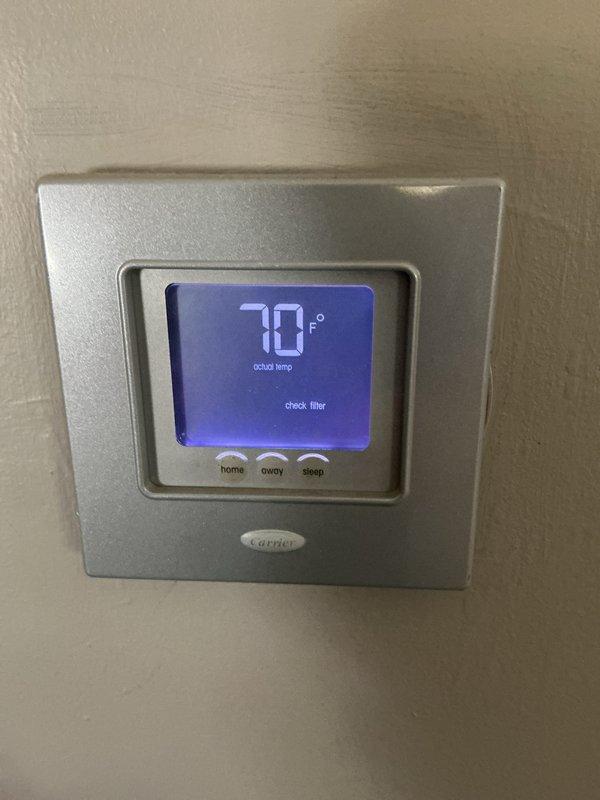 Completed CCC Basic Monthly filter replacement service on residential HVAC system. Replaced 16x25x4 air filter in Carrier system, verified thermostat operation displaying 70°F set point with active filter check reminder, and confirmed proper system operation with all ductwork connections and refrigerant lines intact.