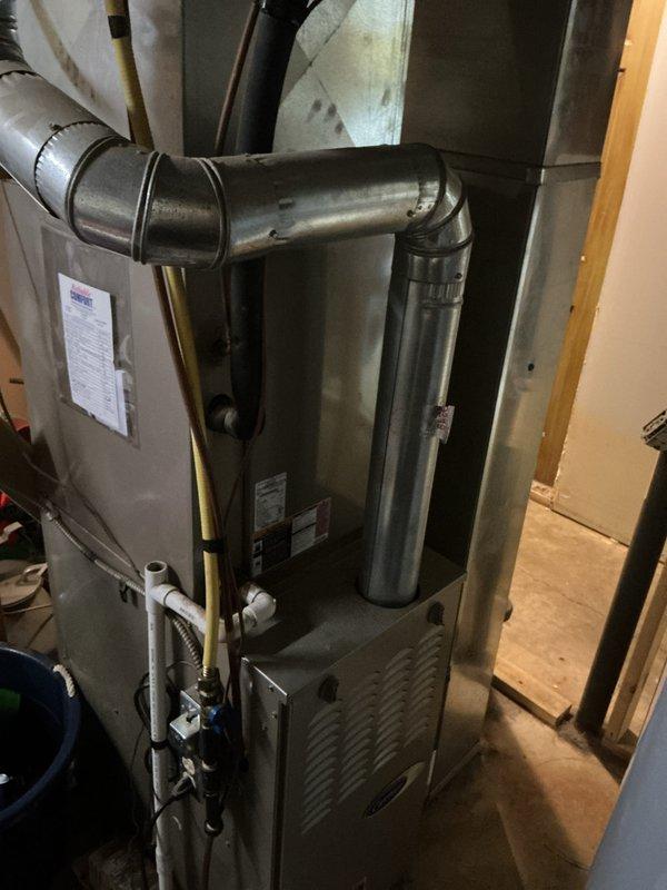 Completed CCC Basic Monthly filter replacement service on residential HVAC system. Replaced 16x25x4 air filter in Carrier system, verified thermostat operation displaying 70°F set point with active filter check reminder, and confirmed proper system operation with all ductwork connections and refrigerant lines intact.