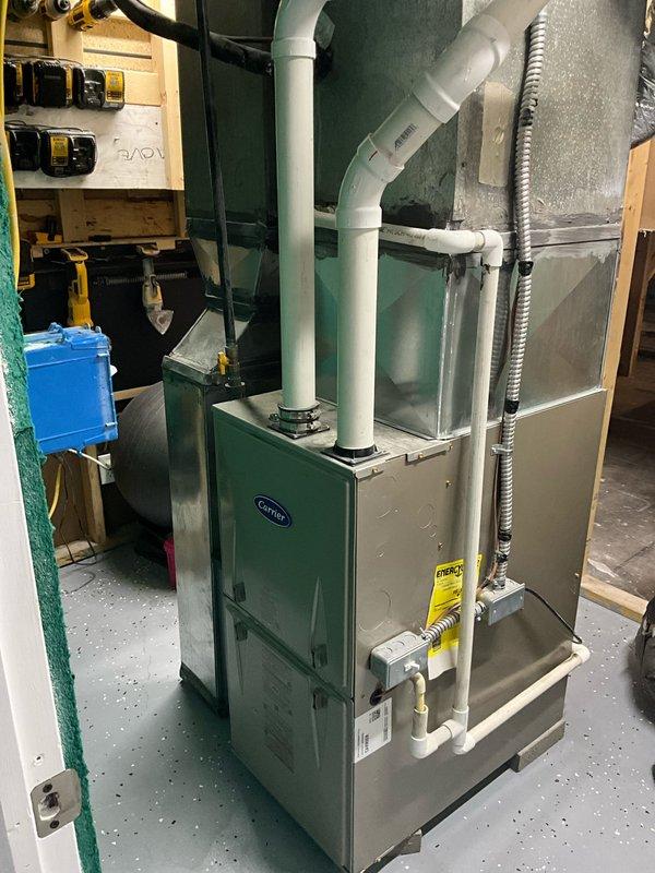 Responded to service call for punctured lineset on R-22 system requiring immediate replacement. Conducted comprehensive site evaluation of existing outdoor Goodman condenser unit and indoor Carrier furnace with evaporator coil. Assessed system age, refrigerant type, and customer timeline requirements. Documented current equipment configuration including condensate drainage, PVC venting, and electrical connections. Provided complete system replacement estimate for new HVAC equipment to address obsolete R-22 refrigerant and damaged lineset. Customer approved expedited installation timeline.