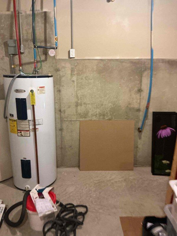 Responded to service call for non-functioning outdoor spigots throughout the property. Upon inspection, identified issues with exterior hose bibs and evaluated the plumbing infrastructure in the basement utility area near the water heater. Assessed the condition of outdoor spigot components on the roof level, noting corrosion and wear on the freeze-proof sillcock assembly. Provided estimate for water softener installation as requested by homeowner.
