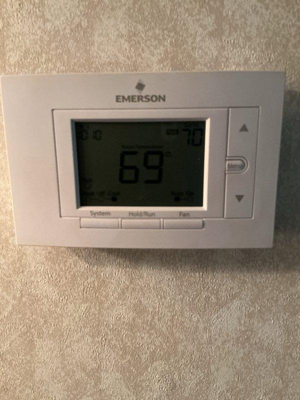 Completed basic monthly cooling maintenance on residential HVAC system. Performed standard inspection of air handler unit, verified thermostat operation showing 69°F setpoint, and replaced 20x20x4 air filter. All equipment found operating within normal parameters with no issues identified.