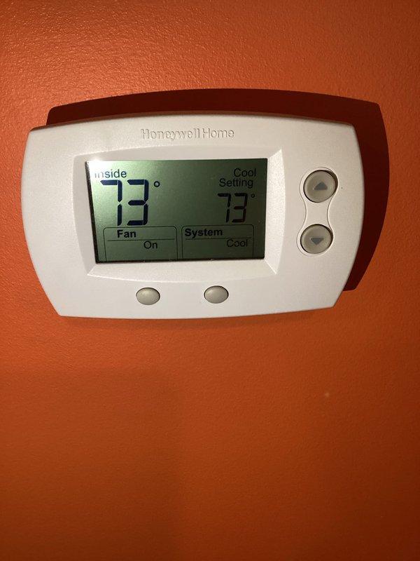 Responded to service call for aging Carrier heat pump system struggling to maintain cooling capacity during high ambient temperatures. Upon arrival, performed comprehensive system diagnostics including refrigerant charge verification, airflow measurements, and electrical component testing. System was operating but required manual reset earlier in day. Conducted leak detection procedures using electronic leak detector and visual inspection of all refrigerant line connections, coils, and service ports - no leaks detected. Verified refrigerant charge within manufacturer specifications using superheat and subcooling measurements. Checked compressor amperage draw, capacitor values, and contactor operation - all within normal parameters. Evaluated indoor airflow at air handler and found filter restriction reducing system efficiency; replaced air filter. Tested thermostat operation and cycling, confirmed proper communication between thermostat and equipment. System age and wear contributing t