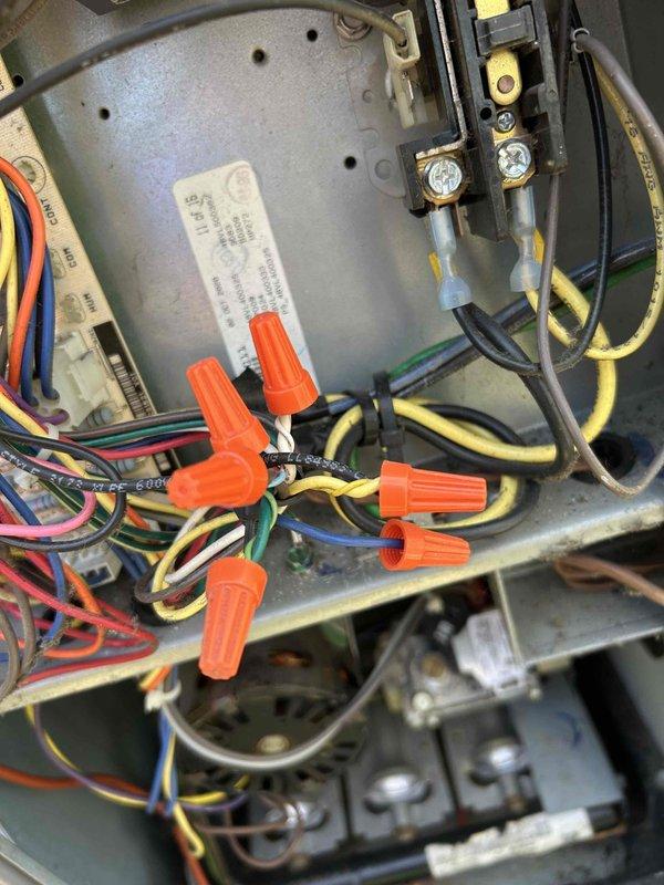 Responded to no-power condition on HVAC system less than 6 years old with blank thermostat display. Diagnosed complete loss of power to both thermostat and outdoor unit, inspected control board wiring connections and blower assembly, and documented electrical connections within air handler cabinet. Restored power to system and verified proper operation of all components.