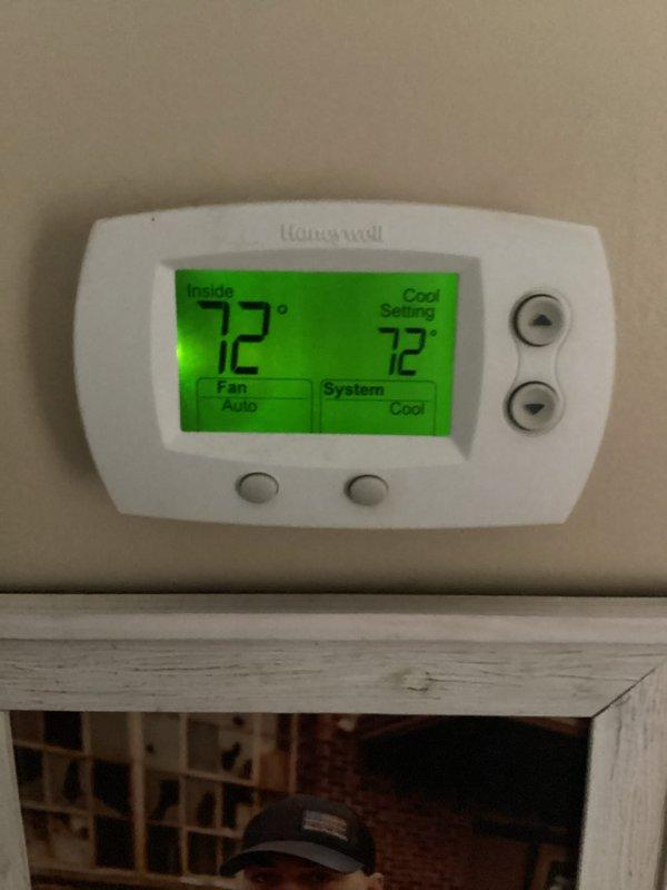 Completed monthly basic cooling maintenance visit on residential heat pump system. Performed standard inspection of stacked HVAC configuration including furnace, air handler, and associated components. Verified thermostat operation showing system maintaining 72°F setpoint in cooling mode with fan set to auto. Checked condensate drain lines and PVC piping connections for proper operation. System operating within normal parameters at time of service.