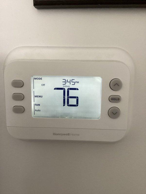 Responded to warranty call for newly installed HVAC system experiencing temperature control issues on first use, with indoor temperature rising from 76°F to 80°F despite thermostat setting. Verified Honeywell Home thermostat programming and operation, adjusted cooling setpoint to 63°F, confirmed system entered cooling mode with equipment response pending, and validated proper thermostat configuration with fan set to auto mode.