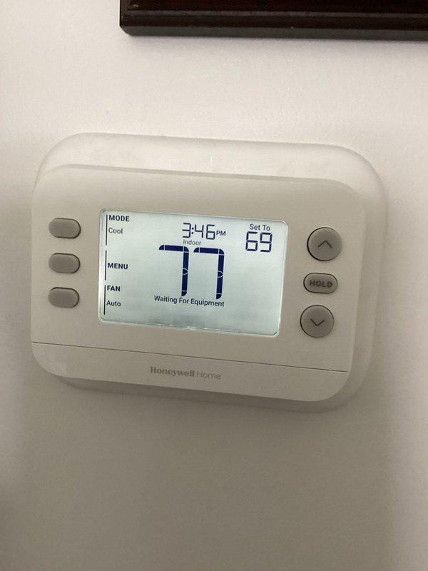 Responded to warranty call for newly installed HVAC system experiencing temperature control issues on first use, with indoor temperature rising from 76°F to 80°F despite thermostat setting. Verified Honeywell Home thermostat programming and operation, adjusted cooling setpoint to 63°F, confirmed system entered cooling mode with equipment response pending, and validated proper thermostat configuration with fan set to auto mode.