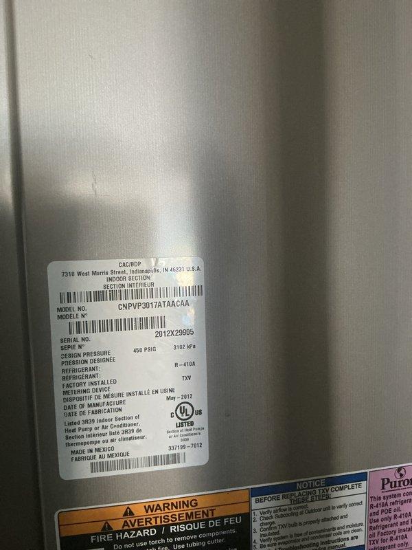 Performed complimentary cooling system maintenance on Carrier indoor unit, model CNPVP3017ATAACAA, manufactured May 2012, utilizing R-410A refrigerant. Completed standard maintenance cleaning procedures on the system, which is currently operating with thermostat set to 66°F cooling mode with fan on auto. Customer plans to re-enroll in maintenance program upon return visit, at which time filter size will be documented for future service records.