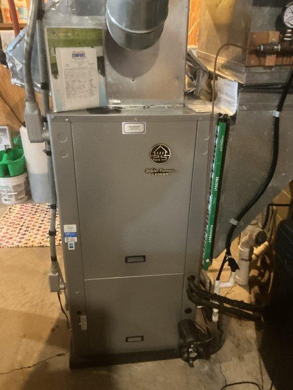 Completed basic monthly cooling maintenance visit on Ruud Prestige LEGENDS residential HVAC system. Performed standard inspection of furnace unit and air handler, replaced 28x30x1 air filter with new Filterbuy filter, and verified proper system operation. All components found in good working condition with no issues identified during this routine preventative maintenance service.