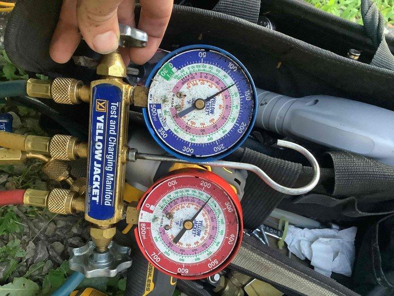 Responded to service call for upstairs mini-split units shutting off after one to two minutes of operation, resulting in inadequate cooling. Inspected wall-mounted indoor units and verified short-cycling condition. Connected manifold gauges to outdoor condensing unit to check refrigerant pressures and diagnose system performance. Evaluated operating pressures on both high and low side to determine proper refrigerant charge and identify potential compressor, electrical, or control board issues causing premature shutdown.