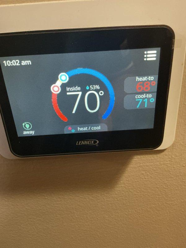 Completed monthly recurring cooling maintenance visit on Lennox air conditioning system. Performed standard preventive maintenance inspection of outdoor condensing unit and verified thermostat operation showing system maintaining 70°F indoor temperature with 53% humidity level. Updated payment information on file per customer request.