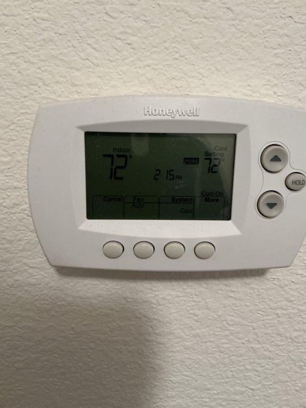 # HVAC Maintenance - Cooling System Service

Completed basic monthly cooling system maintenance visit as part of recurring service agreement. Performed standard inspection and operational checks of cooling equipment. Verified thermostat functionality - Honeywell digital unit displaying proper temperature readings at 72°F with system operating in cooling mode at 2:15 PM. Documented mechanical room conditions including water heater and filtration systems in utility area. System operating within normal parameters with no immediate service needs identified during this routine maintenance visit.