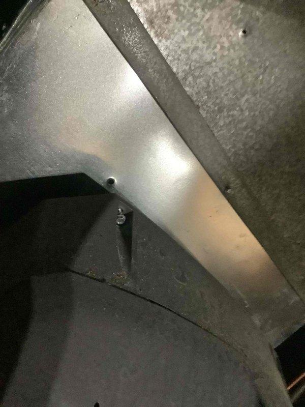 Responded to service call regarding humidifier issue in mechanical room. Upon inspection, found that the whole-house humidifier unit had become detached from its mounting position on the supply ductwork, with the top section leaning forward and no longer properly secured. Repositioned and re-secured the humidifier unit to the ductwork plenum, ensuring proper mounting bracket engagement and stability to prevent future displacement.