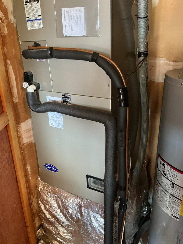 Completed basic monthly maintenance on Carrier air handler system. Performed standard cooling season inspection including refrigerant line inspection, filter replacement with 16x20x1 filter, and system operational check. All equipment operating within normal parameters with no deficiencies noted.