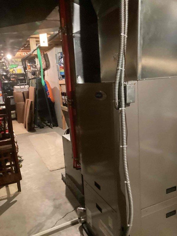 Completed annual cooling maintenance on two HVAC systems. Performed comprehensive inspection of both units including condenser coil cleaning, refrigerant pressure checks, electrical component testing, and airflow verification. Verified thermostat operation showing system maintaining 70°F room temperature in cooling mode with 23% relative humidity. Inspected ductwork assembly and air handler unit in basement mechanical room, confirming proper installation and connections. All systems operating within manufacturer specifications. Customer requires 30x32x2 filter (not included in service). Maintenance agreement renewed through 5/4/2027.