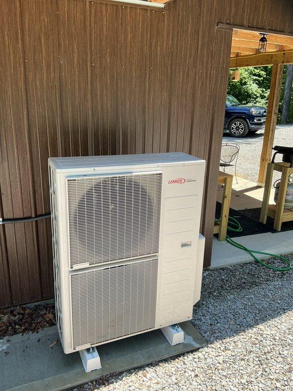 Completed annual basic cooling maintenance on Lennox ductless mini-split system. Inspected outdoor condenser unit mounted on protective pads, verified proper clearances and drainage. Checked indoor wall-mounted air handler, confirmed operational status of controls and display panel. System operating within normal parameters with no issues identified at time of service.