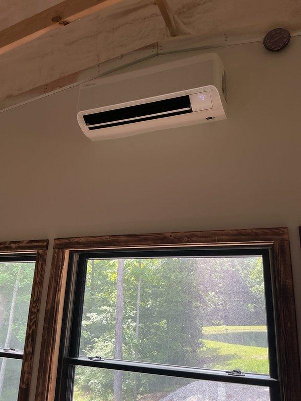 Completed annual basic cooling maintenance on Lennox ductless mini-split system. Inspected outdoor condenser unit mounted on protective pads, verified proper clearances and drainage. Checked indoor wall-mounted air handler, confirmed operational status of controls and display panel. System operating within normal parameters with no issues identified at time of service.