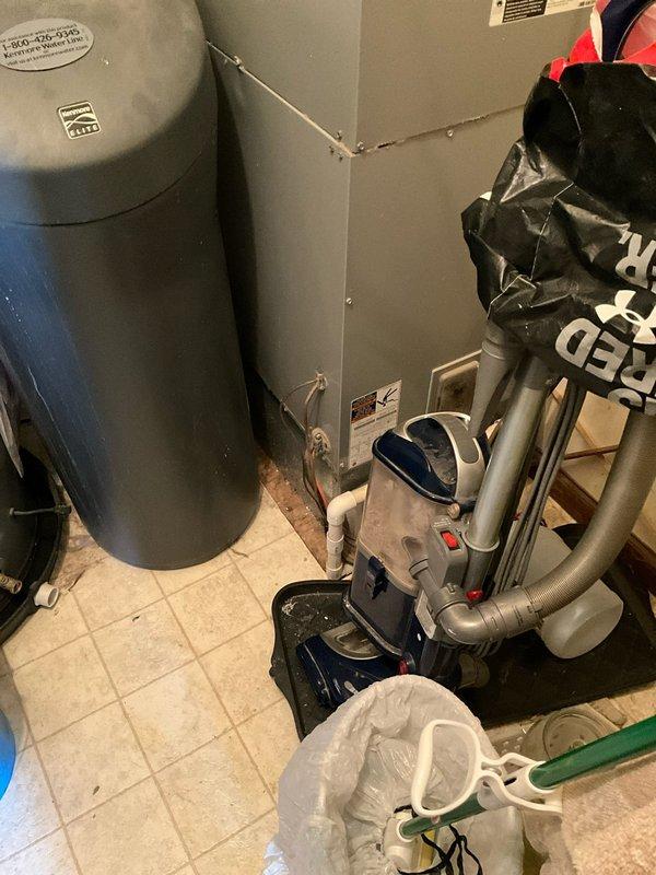Responded to service call for breaker tripping issue and diagnosed catastrophic compressor failure when pin blew out of the compressor during troubleshooting. Assessed existing HVAC system including indoor air handler unit located in basement utility area and outdoor condensing unit. Provided comprehensive replacement estimates for both full system replacement and outdoor unit only options, with customer requesting expedited installation timeline.