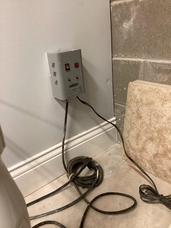 Responded to service call for sump pump running continuously, overheating, and emitting audible alarm signals. Upon arrival, inspected Sentry brand sump pump control system and pump assembly that had been unplugged by homeowner as precautionary measure. Diagnosed malfunctioning float switch causing pump to run without cycling off, resulting in motor overheating and triggering thermal overload protection alarm. Tested control panel indicators and verified electrical connections at wall-mounted Sentry control box. Replaced defective float switch assembly and recalibrated float mechanism to ensure proper activation at correct water levels. Cleaned sump basin of accumulated debris that was interfering with float operation. Reconnected power supply, filled basin with water, and performed multiple operational cycles to confirm proper pump activation and shut-off sequence. Verified all alarm indicators cleared and motor temperature returned to normal operating range.