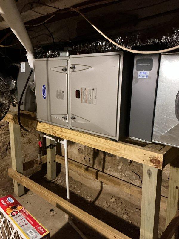 Completed comprehensive cooling maintenance service under comfort care program for Carrier air handler system. Performed full system inspection including filter replacement with 16x25x4 media filter, verified thermostat operation showing 79°F current temperature with 78°F setpoint, checked refrigerant levels, inspected ductwork connections, and confirmed proper airflow throughout system. All components operating within manufacturer specifications with no issues identified.