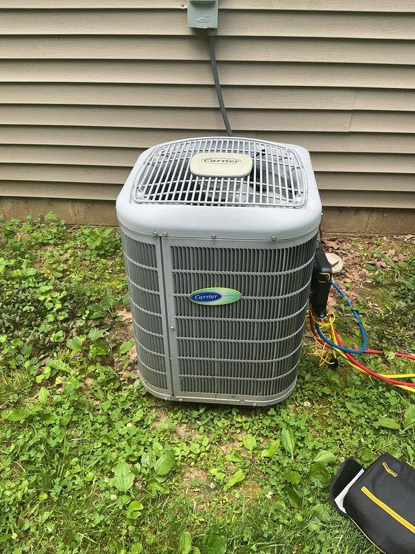 Completed basic monthly maintenance on two cooling systems in preparation for customer's extended summer absence. Performed standard inspection procedures on both units, including exterior Carrier condensing unit and indoor air handler with refrigerant line connections. Noted that standard 20x25x4 and 20x20x4 filters were not included in this service visit.