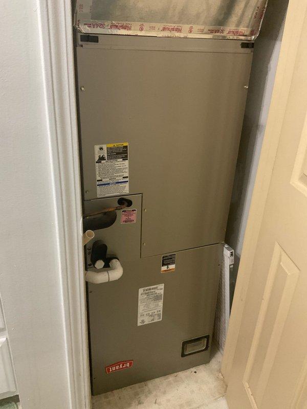 Conducted comfort consultation and system assessment for newly occupied residence with existing split geothermal system. Evaluated current Ducane air handler installation in closet space and discussed options for conversion to gas furnace with split geo configuration or dual fuel high-efficiency system. Assessed feasibility of relocating equipment down hallway to optimize space utilization. Documented existing system components including PVC condensate lines, metallic ductwork connections, and geothermal loop connections with valve assembly and flexible hoses. Prepared full system replacement estimate with expedited timeline for implementation.