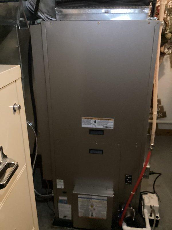 Responded to warranty call for geothermal system installed in December with temperature differential issue—thermostat set to 72°F but house temperature reading 77°F. Performed diagnostic testing using digital multimeter to verify system operation and electrical parameters. Inspected geothermal heat pump unit, condensate pump assembly, and associated piping connections. Documented equipment conditions and system performance with photos for warranty records.