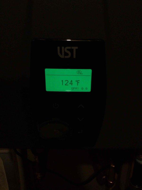 Responded to service call for tankless water heater that would not stay lit. Upon arrival, performed diagnostic evaluation of the unit and identified ignition system malfunction preventing proper operation. Completed necessary repairs to restore functionality, verified proper ignition sequence, and confirmed unit was heating water effectively. Final temperature reading stabilized at 124°F, indicating system was operating within normal parameters and providing adequate hot water supply to the residence.