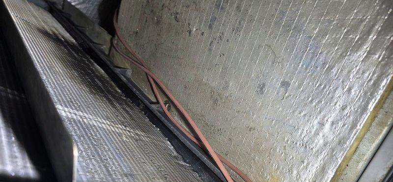 Responded to no cooling complaint on commercial HVAC system. Upon arrival, conducted visual inspection of air handler unit and ductwork assembly in mechanical space. Verified unit condition, examined insulated supply ductwork, and documented equipment installation including electrical conduit routing and insulation integrity. All components photographed for service records, and system assessed for proper operation and maintenance requirements.