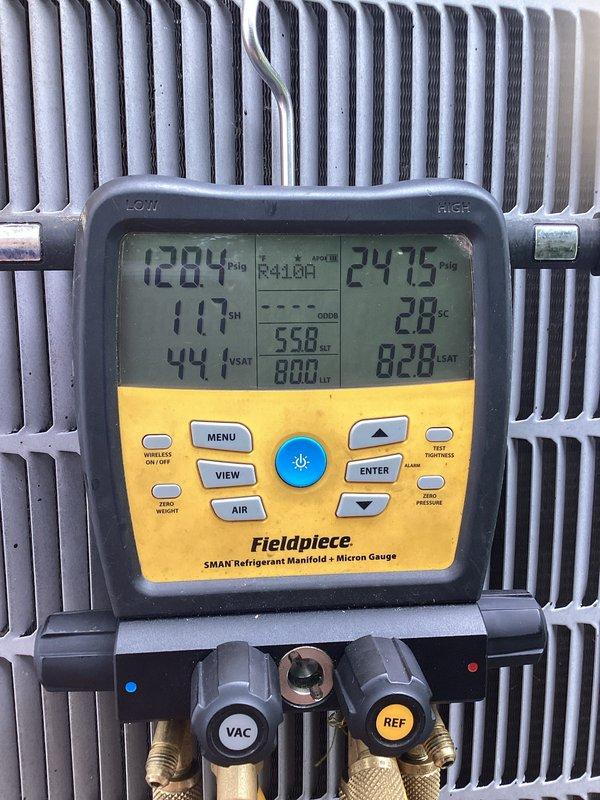 Completed basic monthly cooling maintenance on two HVAC systems. Performed refrigerant pressure and temperature diagnostics using digital manifold gauge, recording superheat and subcooling values to verify proper system charge and operation. Inspected condenser coil condition and confirmed thermostat functionality with ecobee unit maintaining proper temperature setpoint and humidity monitoring.