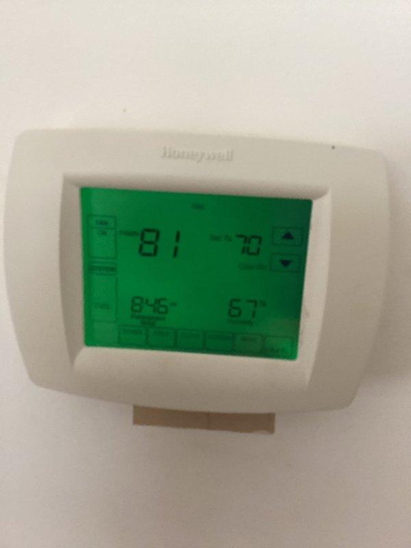 Responded to no cooling call on residential HVAC system. Upon arrival, found thermostat displaying 81°F actual temperature with setpoint at 77°F, indicating system was not maintaining desired temperature. Inspected attic-mounted air handler unit and observed refrigerant line set and electrical connections. Diagnosed and resolved issue, restoring proper system operation and cooling functionality.