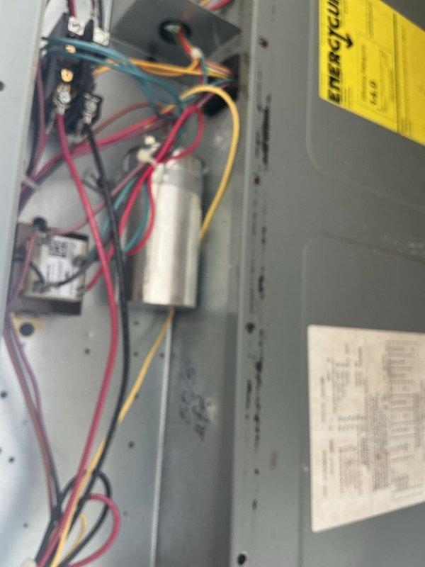 Completed seasonal tune-up on residential HVAC system in preparation for summer cooling season. Performed comprehensive inspection of unit components including electrical connections, capacitor, contactor, and control wiring within the access panel. Verified proper operation of Honeywell Home digital thermostat and system controls, with all components functioning within normal parameters.